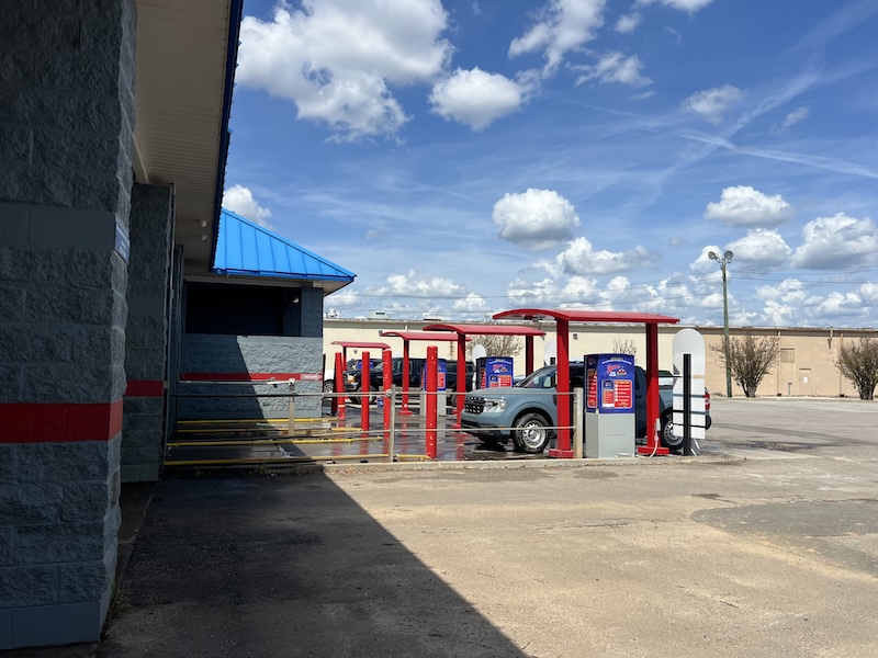 Mo Sudz Wash Club member using the automatic car wash
